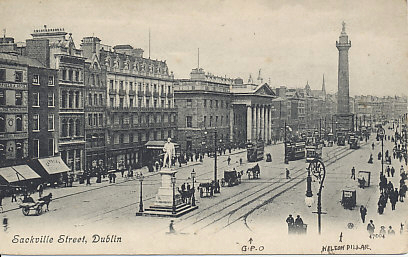 Sackville Street in Dublin, Ireland, looking to the northwest. In the foreground is the monument to Daniel O'Connell, in the distance, that to Admiral Nelson. Between them, its portico prominent, is the General Post Office, the rebel headquarters in the 1916 Easter Rising. On the back is a message dated October 1, 1906, and the card was postmarked the same day.
Text:
Sackville Street, Dublin
47004
Handwritten: G.P.O. Nelson Pillar
Reverse:
Valentine, Dublin
Message dated October 1, 1906