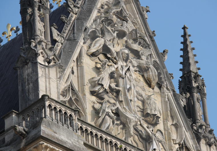 The Assumption of the Virgin Mary, Rheims Cathedral. German artillery first shelled the magnificent Cathedral of Rheims on September 19, 1914 igniting scaffolding that covered the north tower, and beginning a fire that spread to other woodwork within the building. The building was intermittently shelled throughout the war, particularly in the spring of 1917 when it was struck with 70 high-caliber shells.