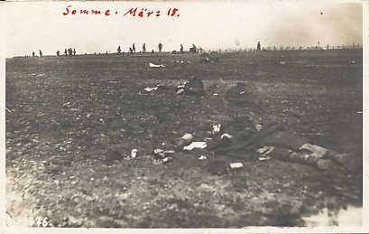 Living and dead soldiers on the Somme in March, 1918. Operation Michael, the German spring offensive 1918 began on March 21. Men and barbed wire line the horizon; dead soldiers lie in the foreground.