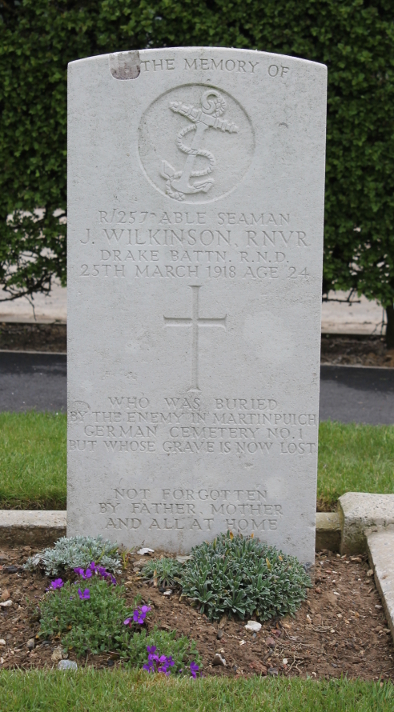 Headstone of Able Seaman J. Wilkinson at Martinpuich Cemetery, Martinpuich, France. Wilkinson died March 25, 1918, age 24.
Text:
[In/To] the Memory of
R/257 Able Seaman
J. Wilkinson, RNVR
Drake Battn. R.N.D.
25th March 1918 Age 24
Who was buried by the enemy in Martinpuich German Cemetery No. 1 but whose grave is now lost
Not forgotten by Father, Mother and all at home